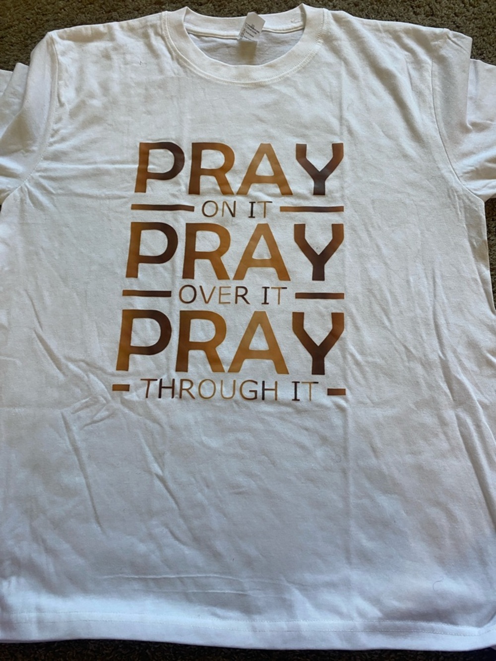 White Graphic Tee with Metallic Bronze "PRAY" Print